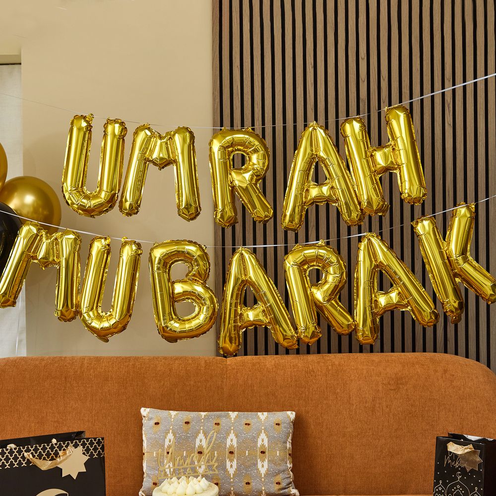 Umrah Mubarak -kultaista ilmapalloviirinauhaa