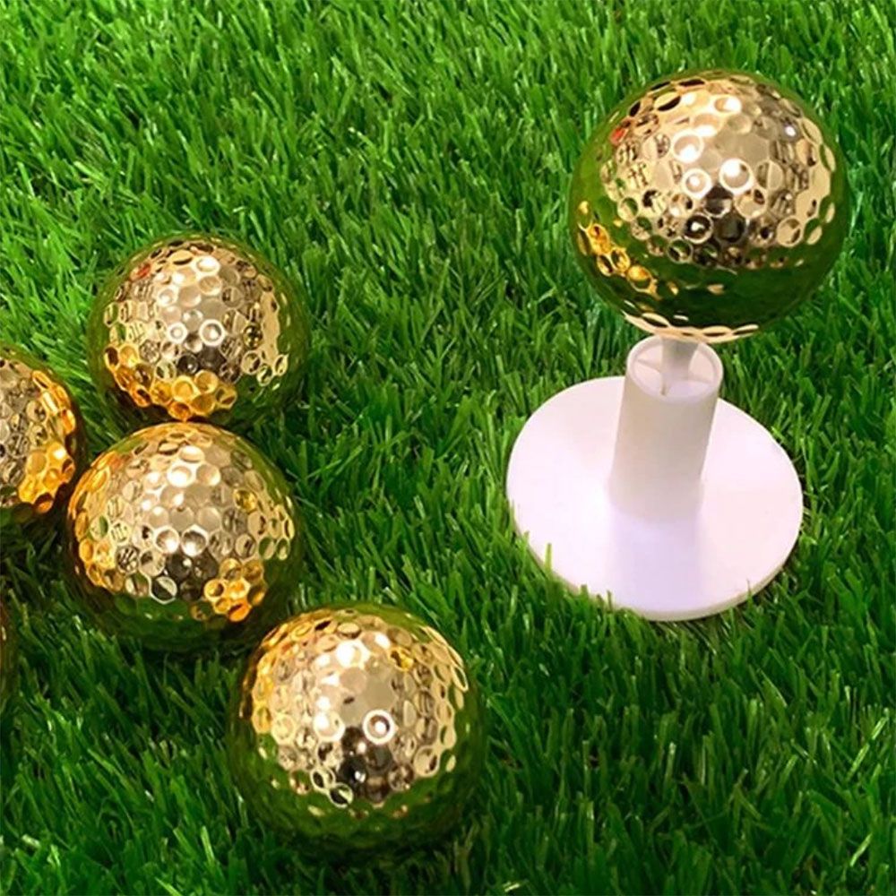 Guldfärgad Golfboll