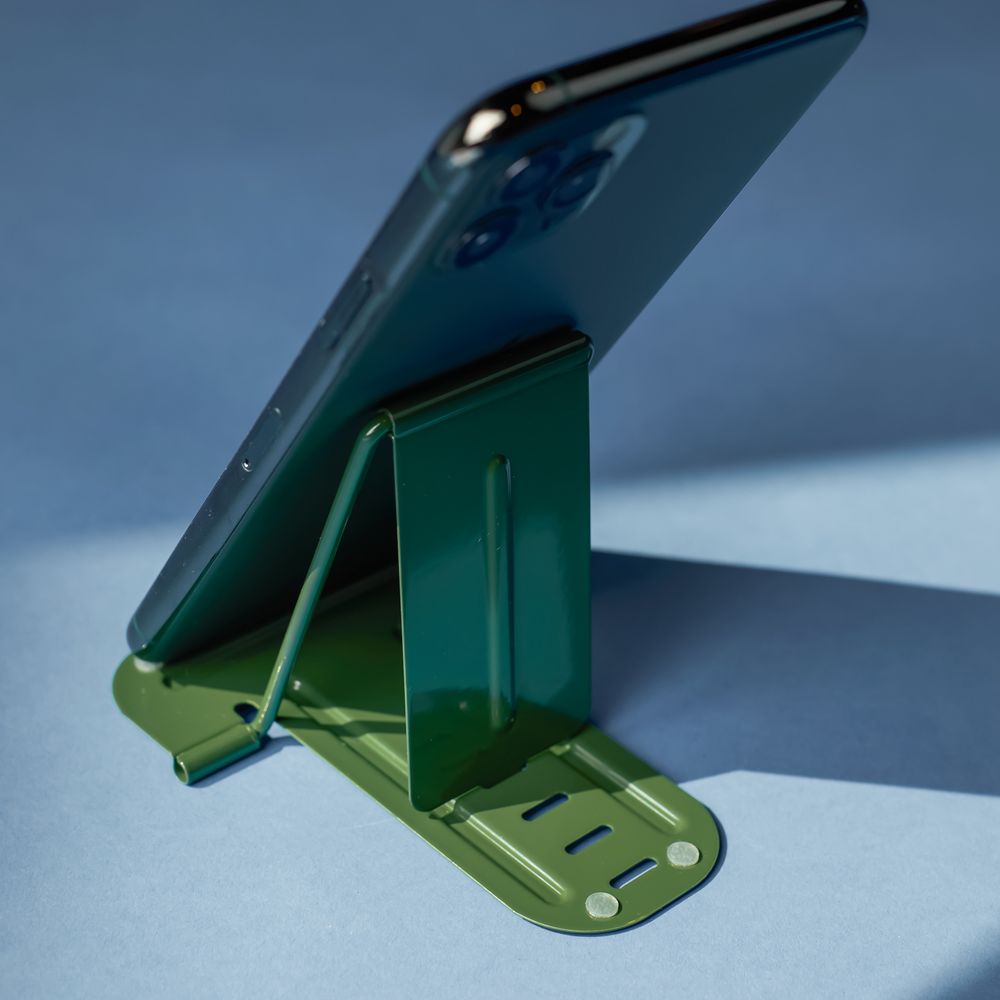 Sammenleggbar mobilholder i metall