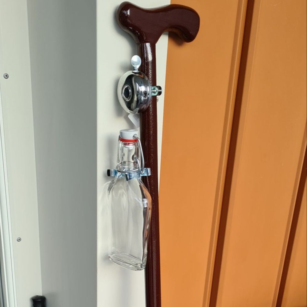 Stokk med Lommelerke og Ringeklokke