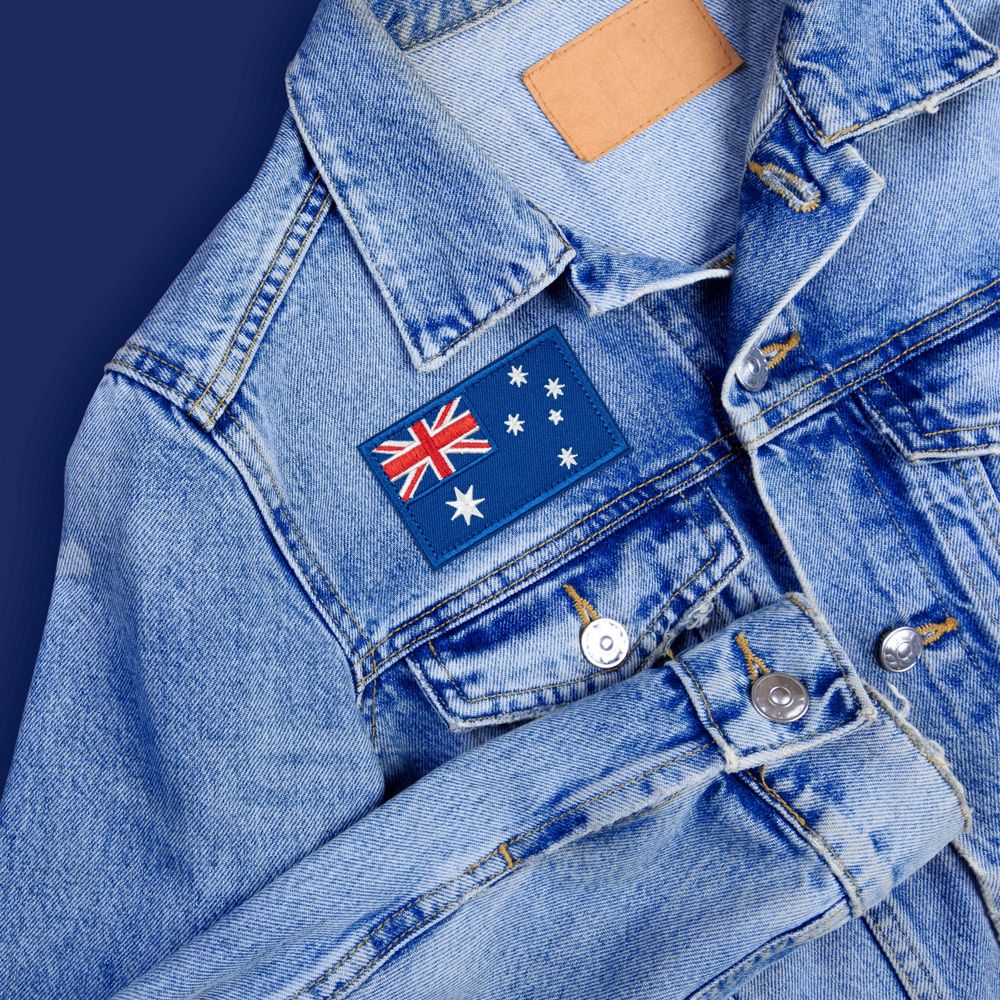 Tygmärke Australiens Flagga